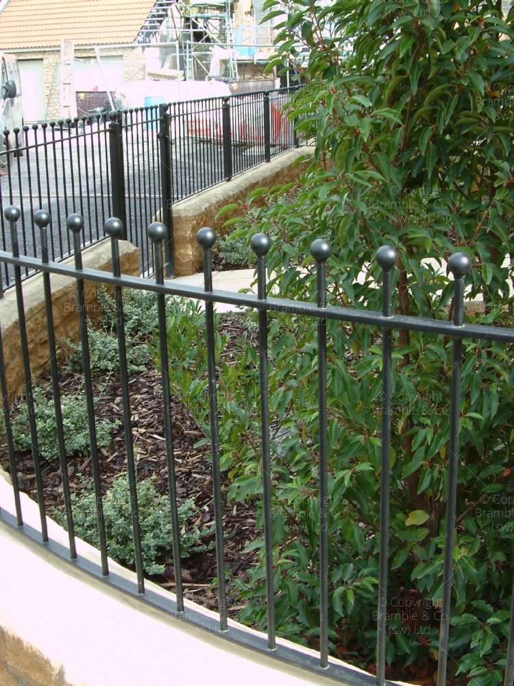Curved Wrought Iron Railings.